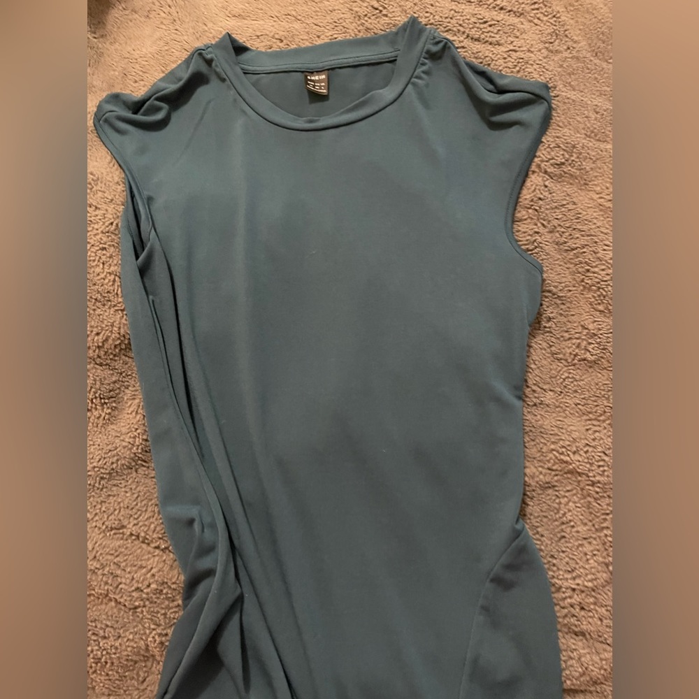Blue, high neck, body con dress with small slit!